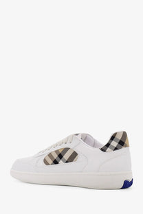 Burberry men’s low top white leather sneakers with beige black tan check side panel and vibrant blue rubber toe cap