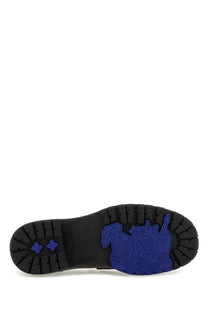 Burberry men’s moccasin rogue black with black rubber sole and vibrant blue embossed horse and rider design
