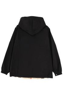Black hooded burberry men’s reversible check jacket showing subtle pattern at the hemline