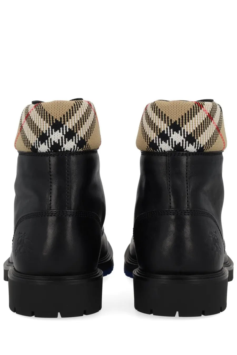 Burberry men’s rogue black leather boots with beige black white and red checkered fabric collar visible from back side