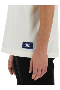 Burberry men’s white cotton t-shirt with blue and black striped patch featuring a white horse logo