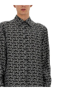 Burberry men’s black button-up shirt with repeating white geometric pattern perfect for casual wear