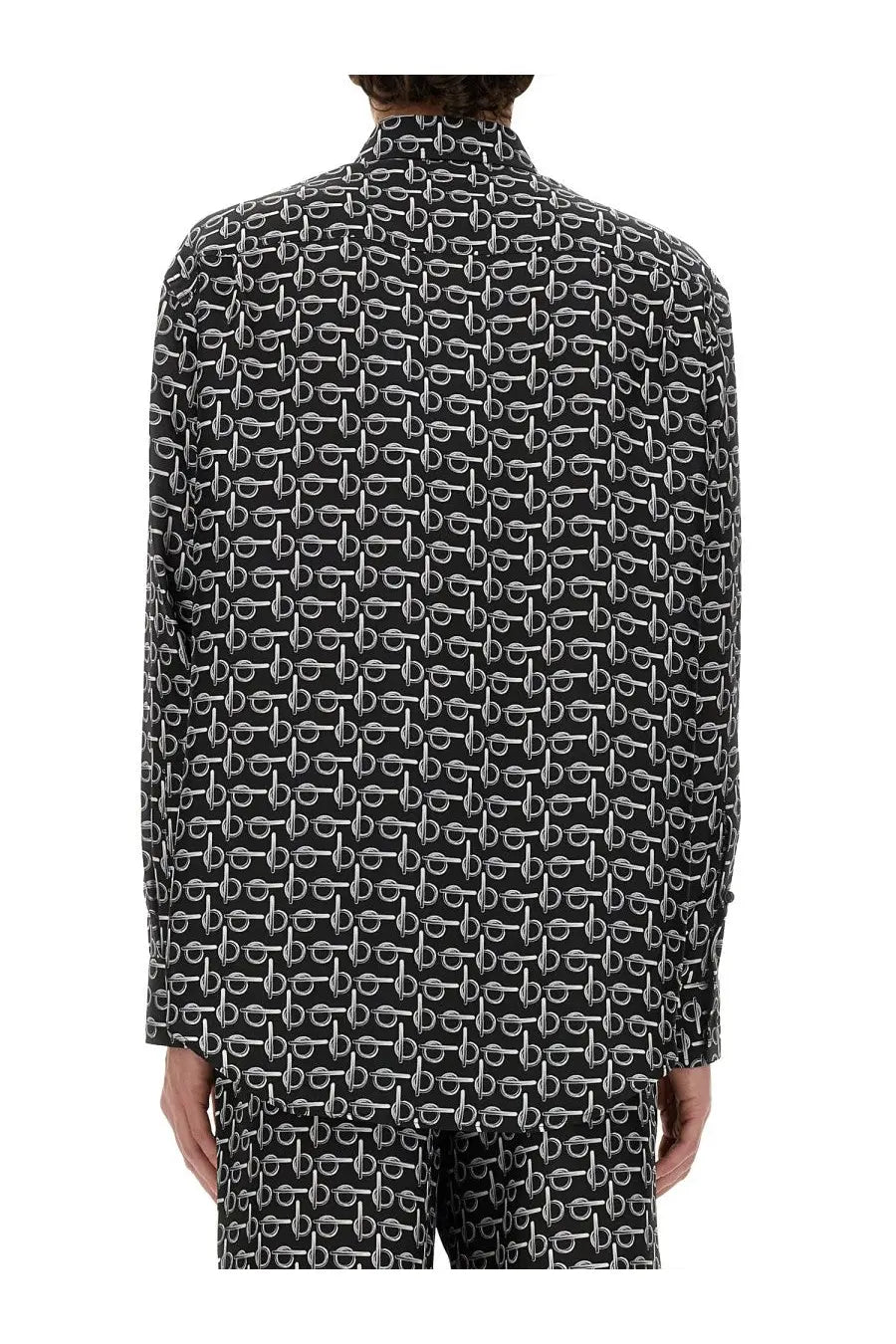 Burberry men’s black long-sleeved button-up shirt with repeating white geometric pattern in cotton fabric