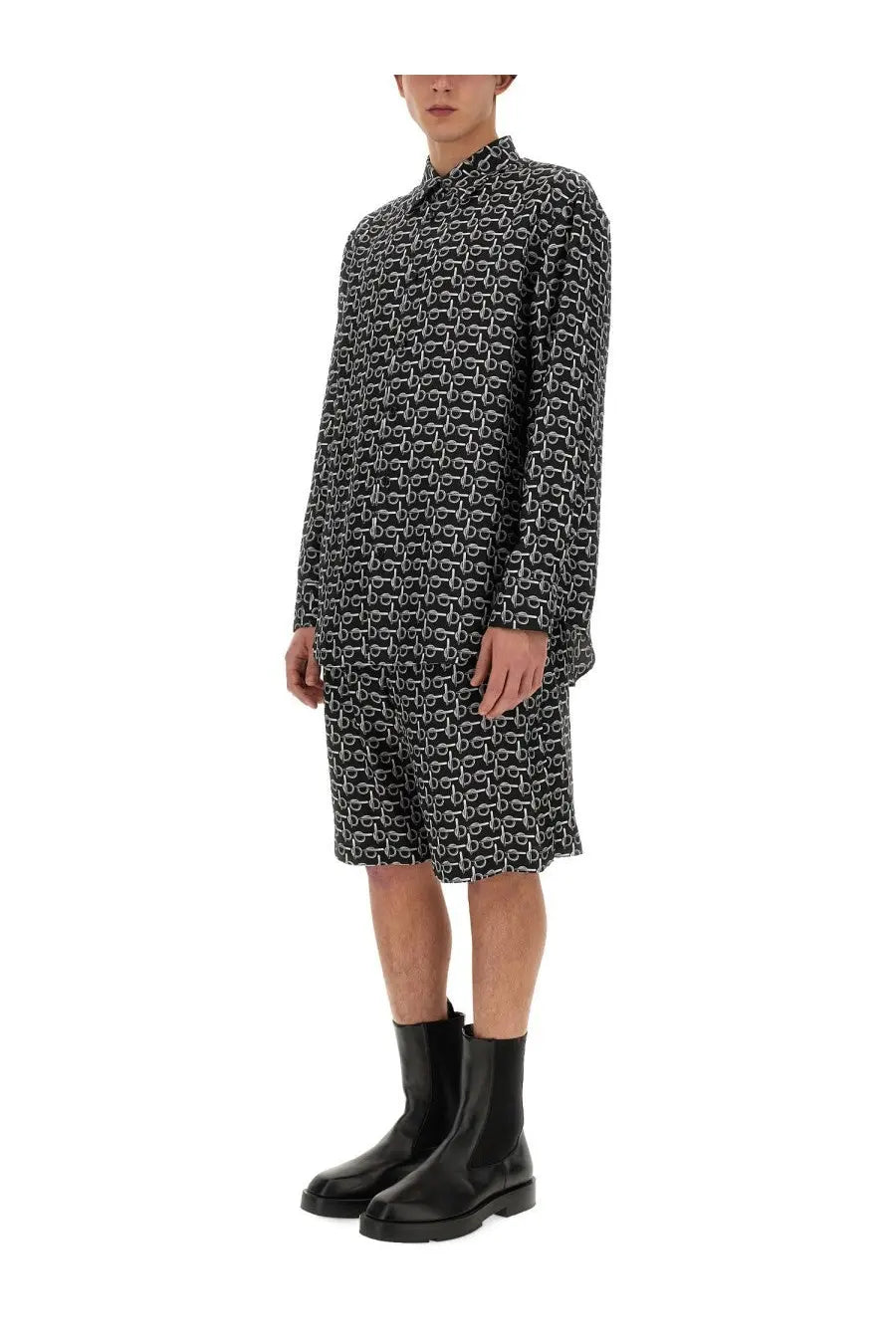 Burberry men’s black shirt dress with long sleeves collar and black and white patterned fabric visible from the front