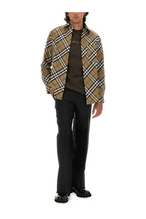 Burberry men’s shirt in tan and black plaid with classic check pattern buttoned front and chest pocket