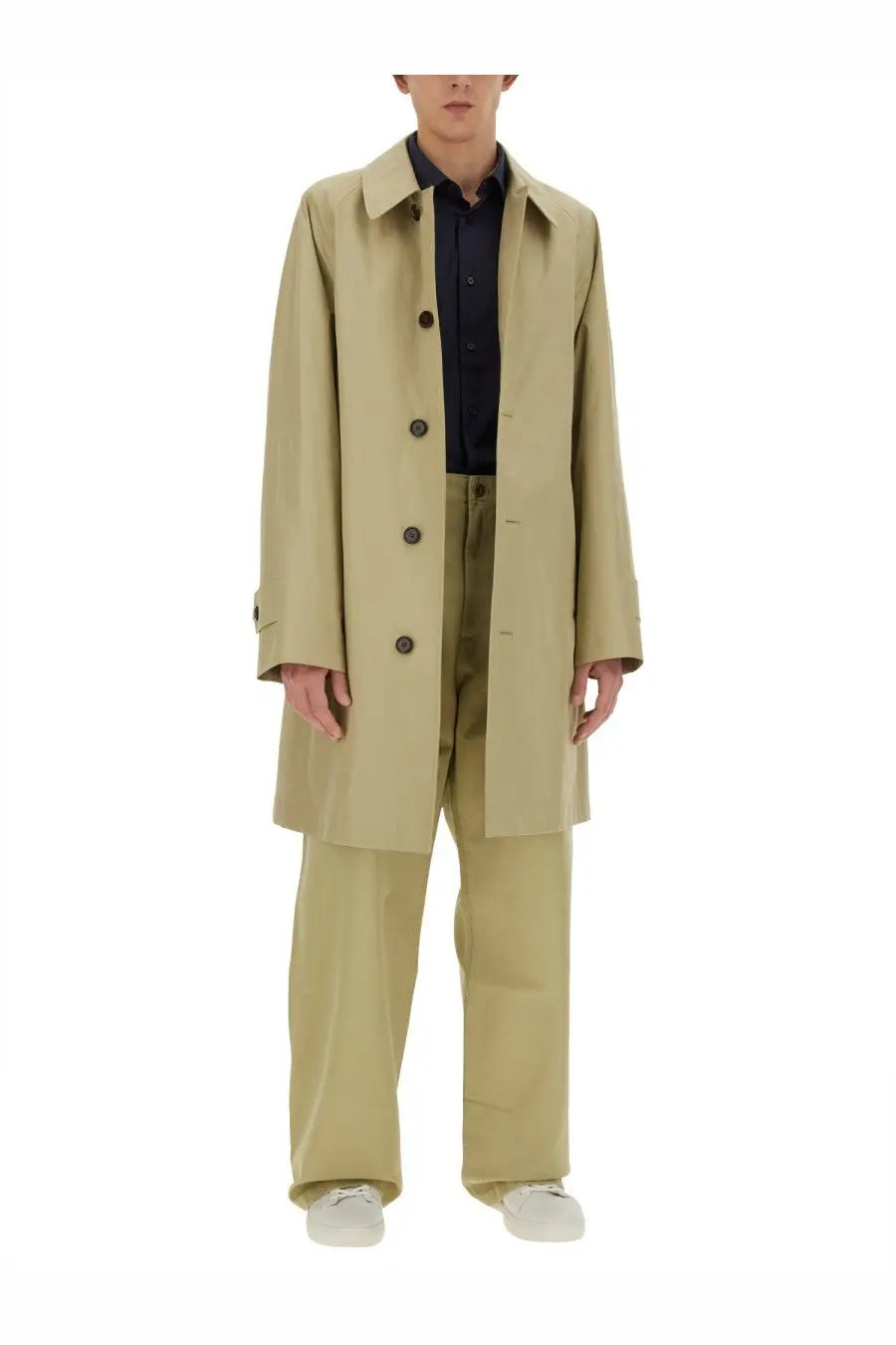 Beige trench coat with dark brown buttons and classic collar paired with burberry men’s straight leg pants beige