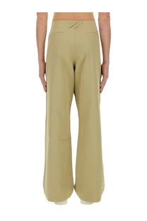 Burberry men’s straight leg beige trousers featuring a clean tailored fit with subtle front pockets