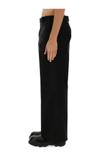 Burberry men’s tailored black wide-leg trousers with sleek fit and subtle pleats at the waistband