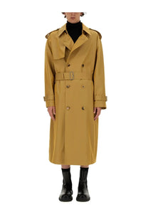 A mustard-yellow burberry men’s trench coat with belted waist double-breasted front and epaulets