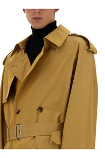 Burberry men’s beige trench coat with belted waist and structured shoulders in tan fabric