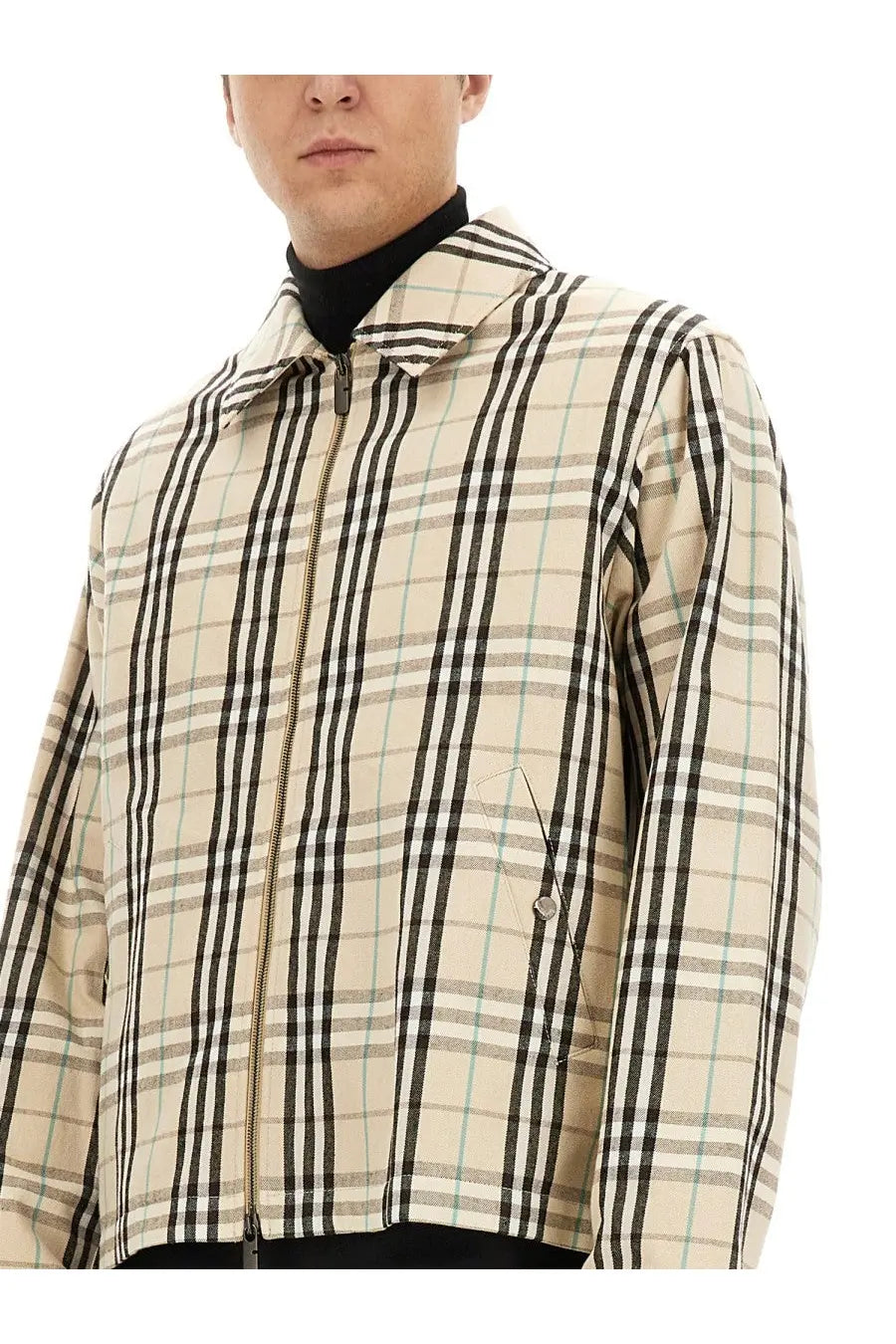 Burberry men’s vintage check beige bomber jacket with black plaid and subtle teal accents in lightweight fabric