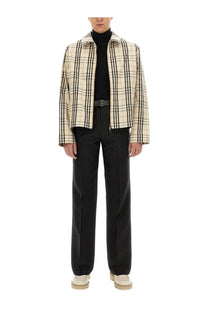 Burberry men’s vintage check beige quilted jacket with black plaid pattern and structured collar