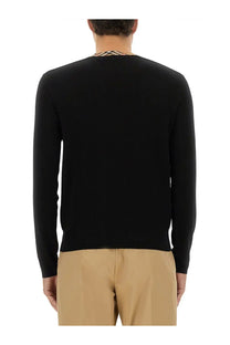 Burberry men’s black wool jersey long-sleeved knit sweater with beige and black geometric patterned collar