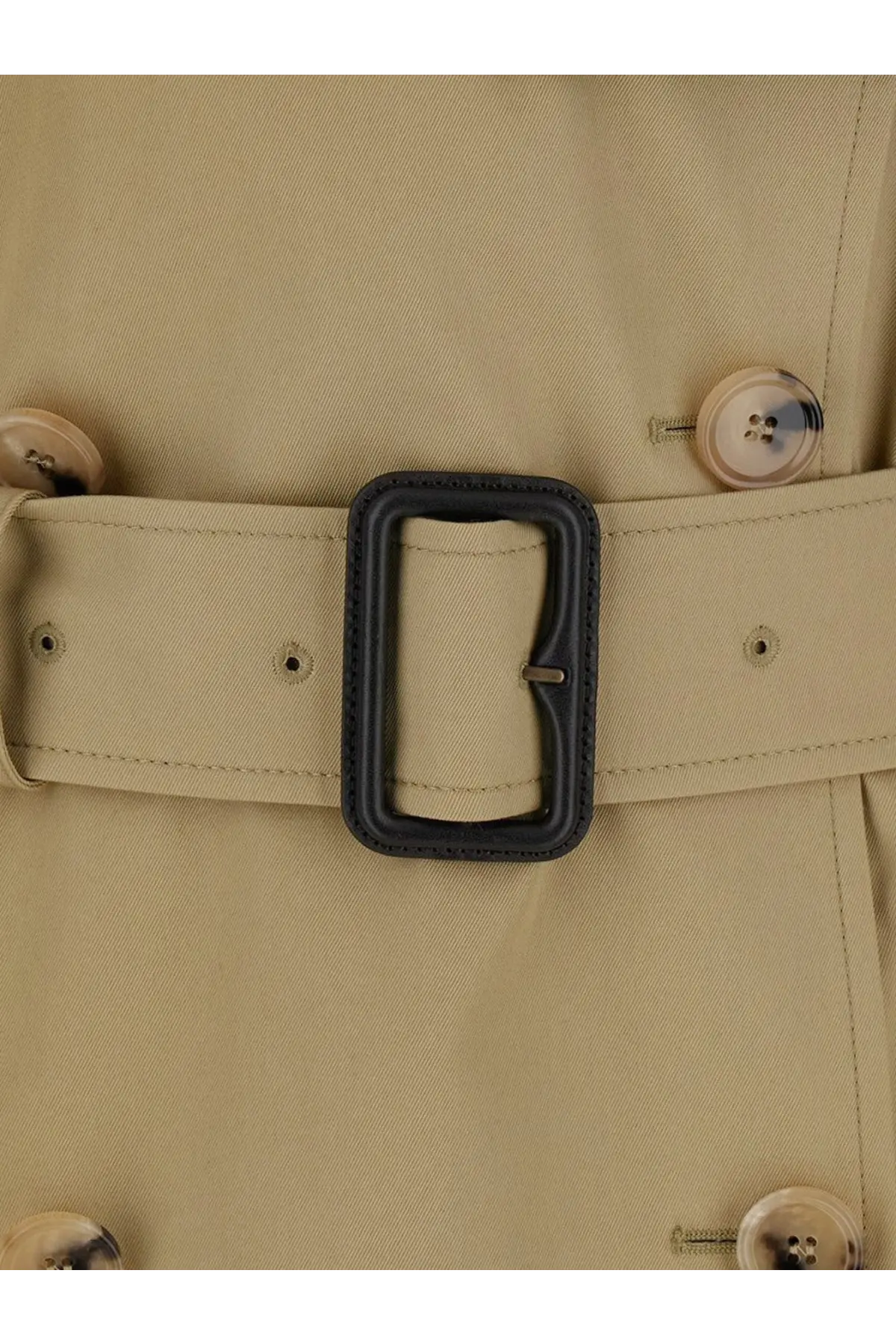 Beige burberry women’s belmont cotton trench coat belt with black leather buckle close-up view