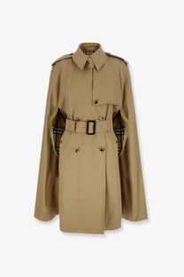 Burberry women’s Belmont beige cotton trench coat with belted waist and checkered lining featuring classic design details