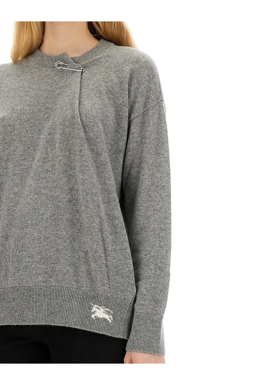 Burberry women’s grey cashmere sweater with silver safety pin neckline and white embroidered logo on cuff