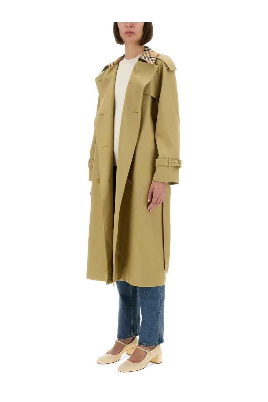 Beige trench coat with classic collar and buttoned cuffs paired with burberry women’s white cashmere sweater