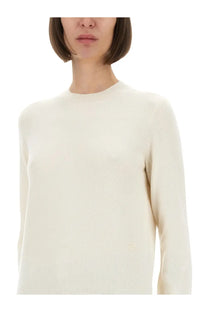 Burberry women’s cream-colored cashmere sweater with long sleeves and a soft ribbed crew neckline