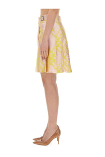 Burberry women’s pleated skirt in soft pink and vibrant yellow geometric pattern with matching belt and silver buckle