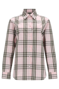 Burberry women’s check shirt blue featuring a pink and black plaid long-sleeved button-up design with a classic collar