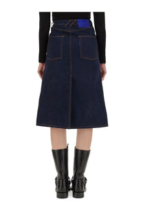 Burberry women’s dark blue denim midi skirt with bright blue waistband patch and visible stitching details
