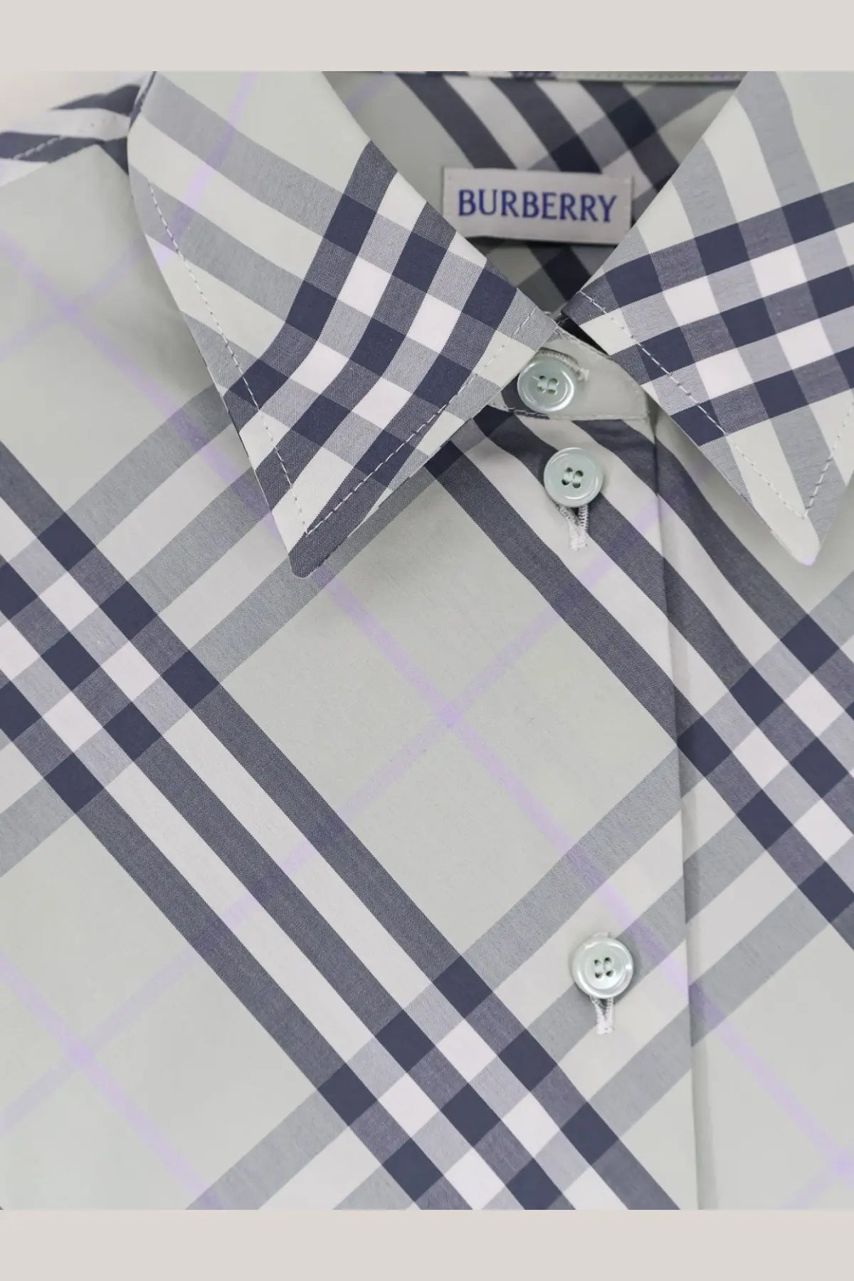 Burberry women’s emma cotton shirt in navy and gray checkered pattern with silver buttons