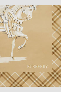 Beige Burberry women’s foulard in seta featuring a stylized horse illustration and classic plaid border