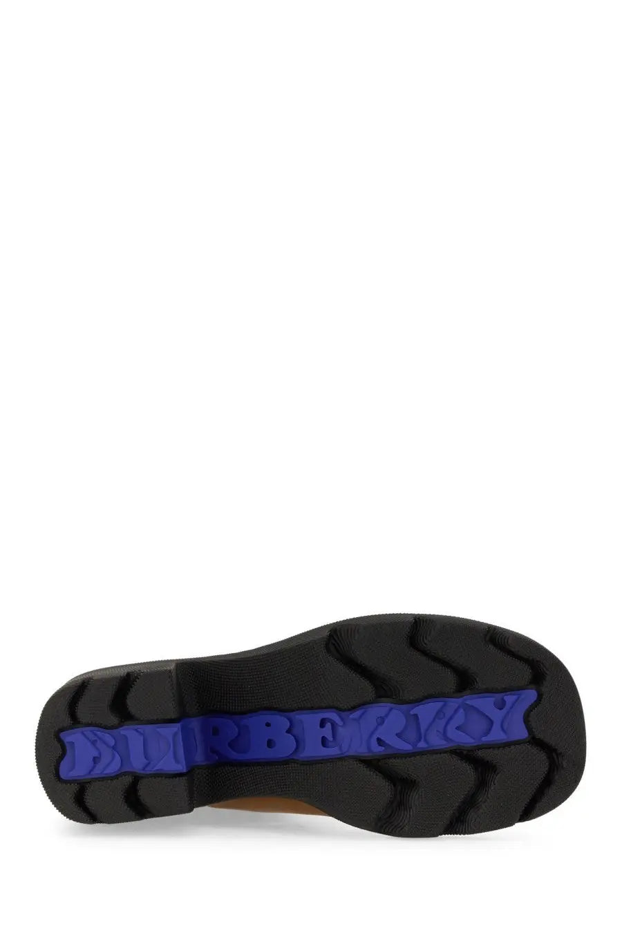 Black rubber sole with bold blue embossed burberry logo stripe on beige leather women’s boot back side