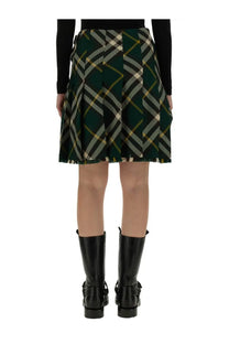 Burberry women’s mini skirt dark green plaid pleated with white and mustard yellow stripes classic tailored design