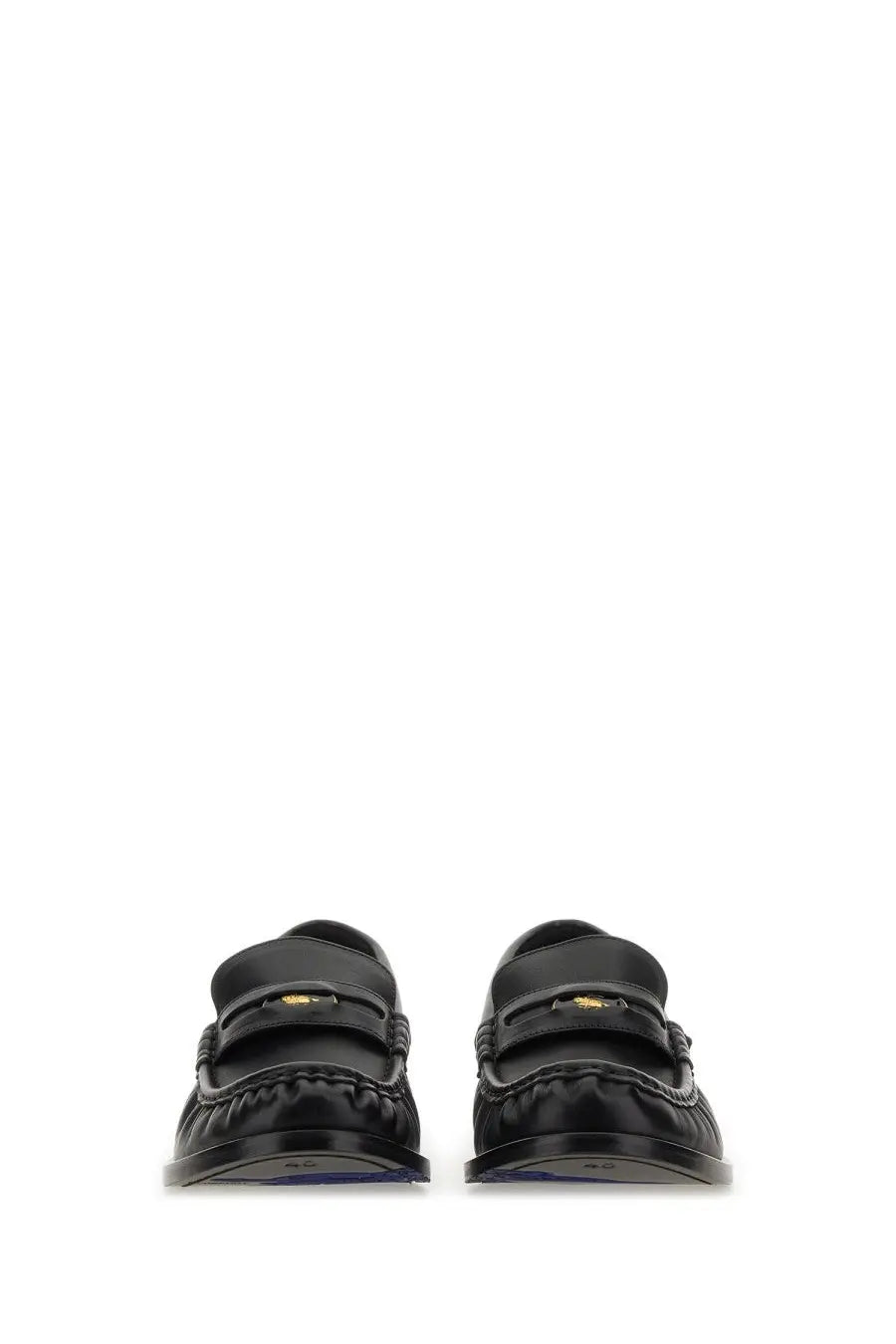 Burberry women’s black leather moccasin cadet loafers with glossy finish and gold tone logo strap detail