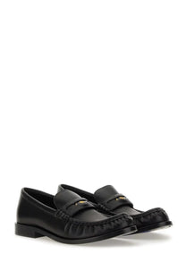 Black leather Prada loafers with gold-tone logo detailing in Burberry women’s moccasin cadet black design