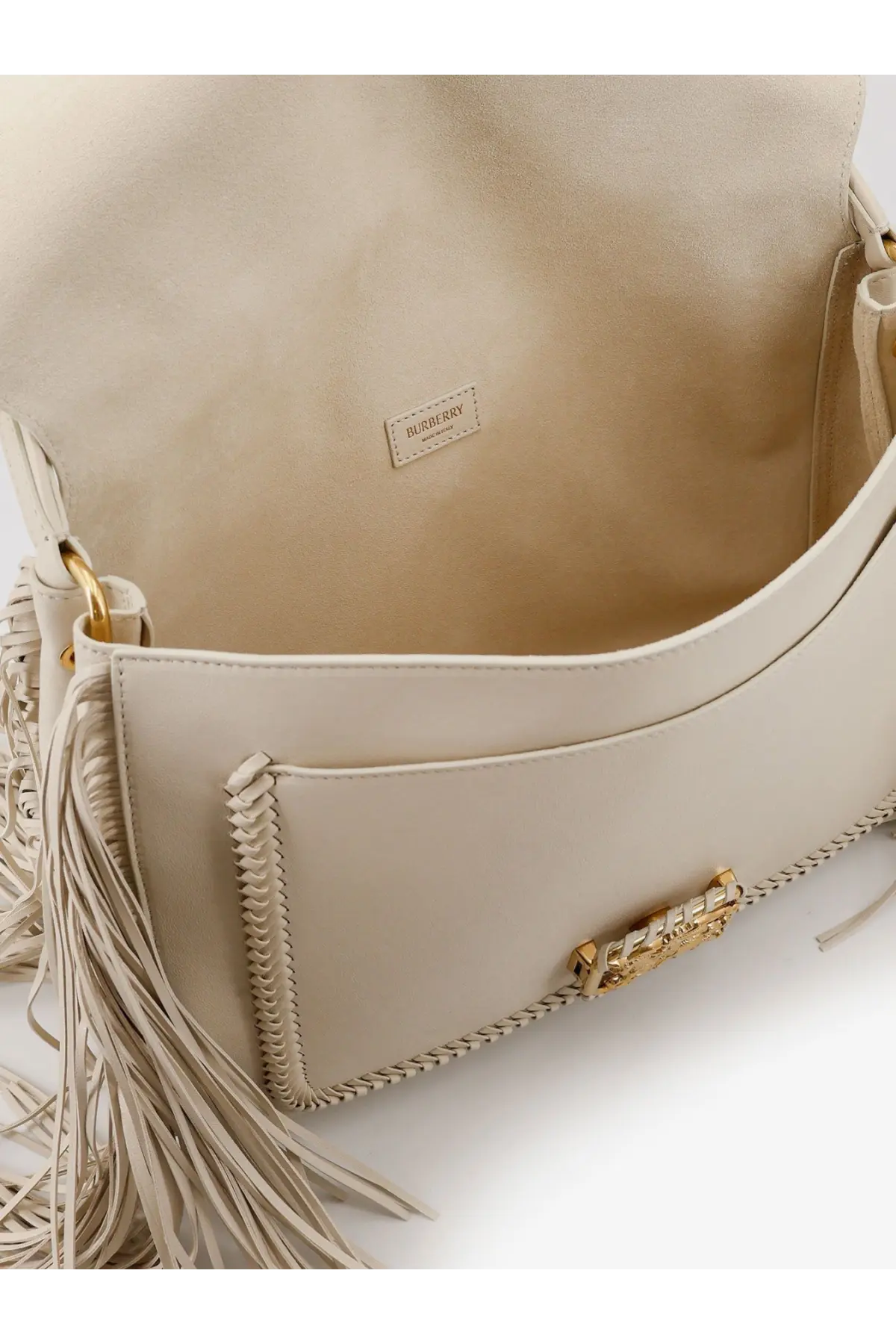 Beige leather burberry women’s rider crossbody handbag with gold-tone hardware and fringe detailing