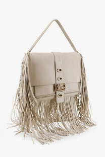Beige leather Burberry women’s rider handbag soap with fringe gold tone hardware and structured flap closure