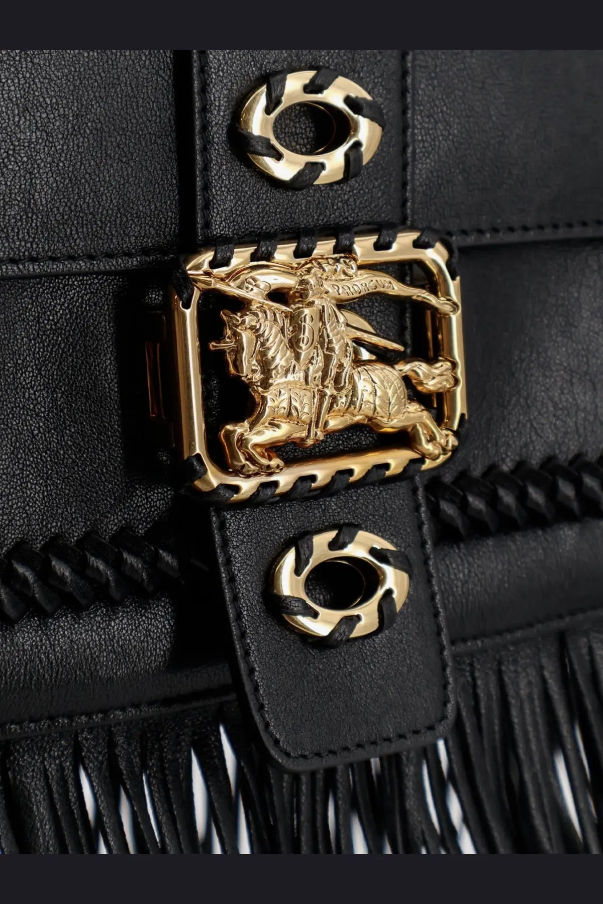 Burberry women’s rider leather shoulder bag black with gold-tone buckle featuring horse and rider emblem