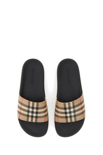 Burberry women’s black slide sandals with beige black and red checkered fabric strap for casual wear
