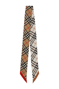 Burberry women’s beige black and red plaid silk scarf with classic Burberry check pattern titled Sciarpa Sottile Check Beige