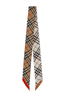 Beige black and red plaid silk scarf with classic Burberry check pattern from Burberry women’s Sciarpa Sottile Check Beige