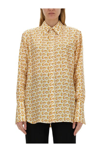 Burberry women’s shirt beige cream silk blouse with gold-toned abstract eye pattern for stylish wear