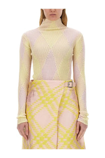 Burberry women’s multicolor pastel yellow and pink argyle ribbed knit turtleneck sweater with subtle shimmer