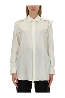 Burberry women’s cream-colored silk shirt with structured shoulder pads and classic button-down front