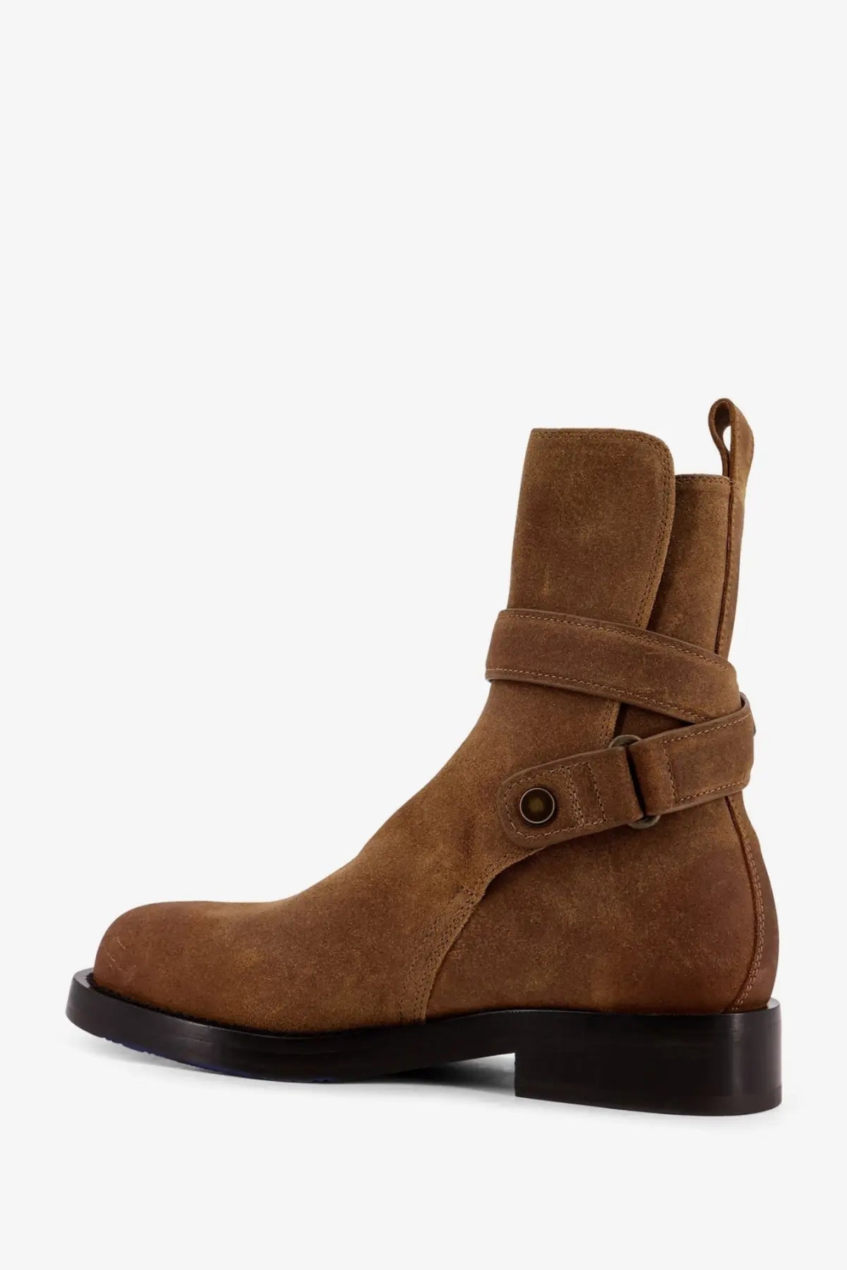 Burberry women’s tan suede ankle boot with black rubber sole and adjustable strap detail boat style