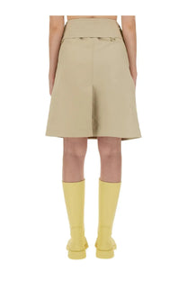 Beige Burberry women’s trench skirt with high-waisted pleated design and belt loops in structured fabric