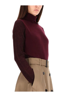 Burberry women’s red wool blend pullover with a burgundy turtleneck top textured knit sleeve and smooth body fabric