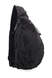 Black c.p. company men’s backpack in nylon showing the back side with adjustable straps and logo patch