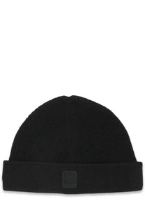Black ribbed knit beanie with folded brim and square logo patch on front from cp company mens berretto con black