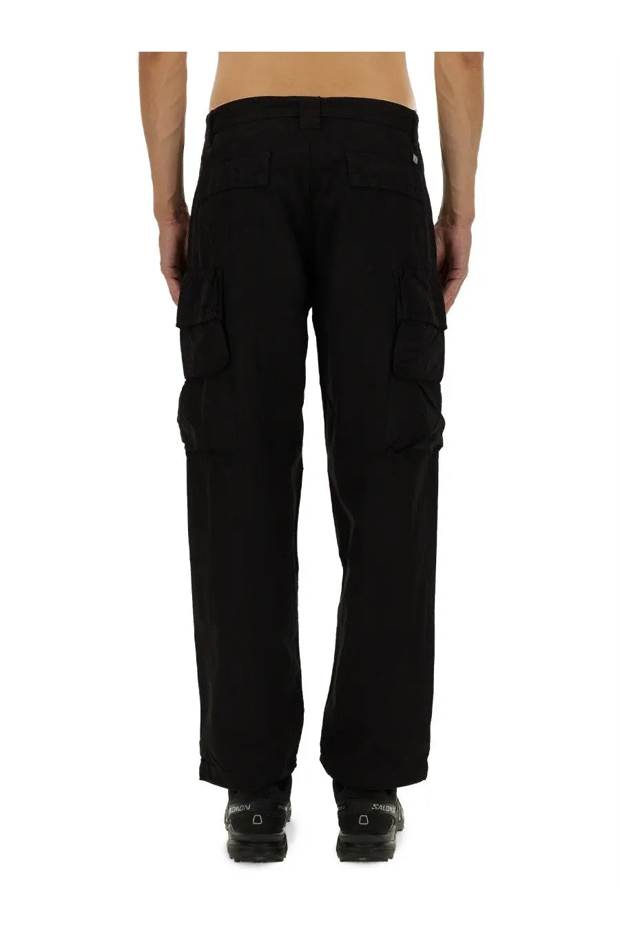 Black cargo pants by c.p. company for men with multiple pockets and a straight-leg cut in durable fabric
