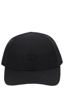 Black c.p. company men’s chrome baseball cap in black nylon with adjustable back strap shown from the back side