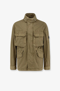 Olive green cotton blend utility jacket with multiple flap pockets and high collar by c.p. company dried herb