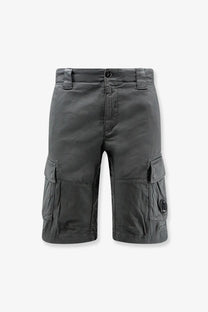 Dark gray cotton cargo bermuda shorts for men with multiple pockets and subtle c.p. company logo on thigh