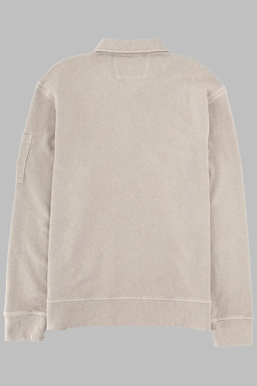 Beige cotton polo shirt with ribbed collar and cuffs featuring subtle textured weave from C.P. Company men’s collection
